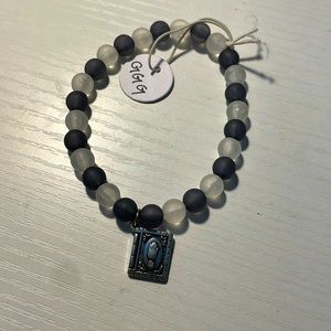 Grey and white pendant bracelet